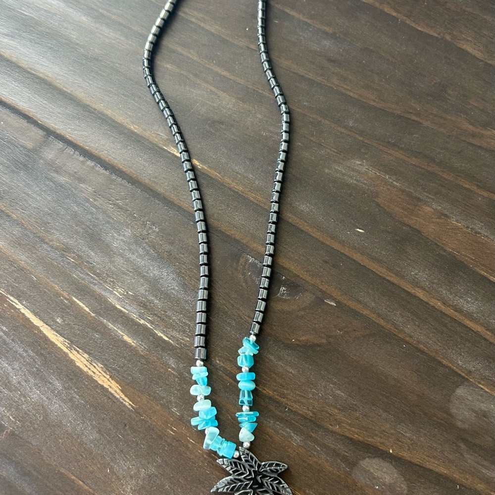 Silver and Blue Beaded Necklace with Leaf Pendant